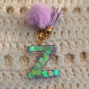 Purple and Gold Keychain with Pom Pom